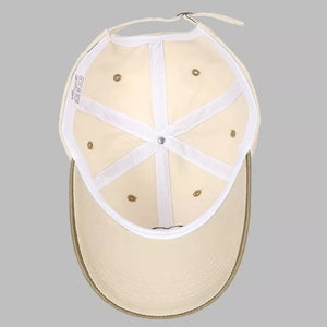 Cream cotton baseball cap interior with tan brim detail and embroidered heart logo.