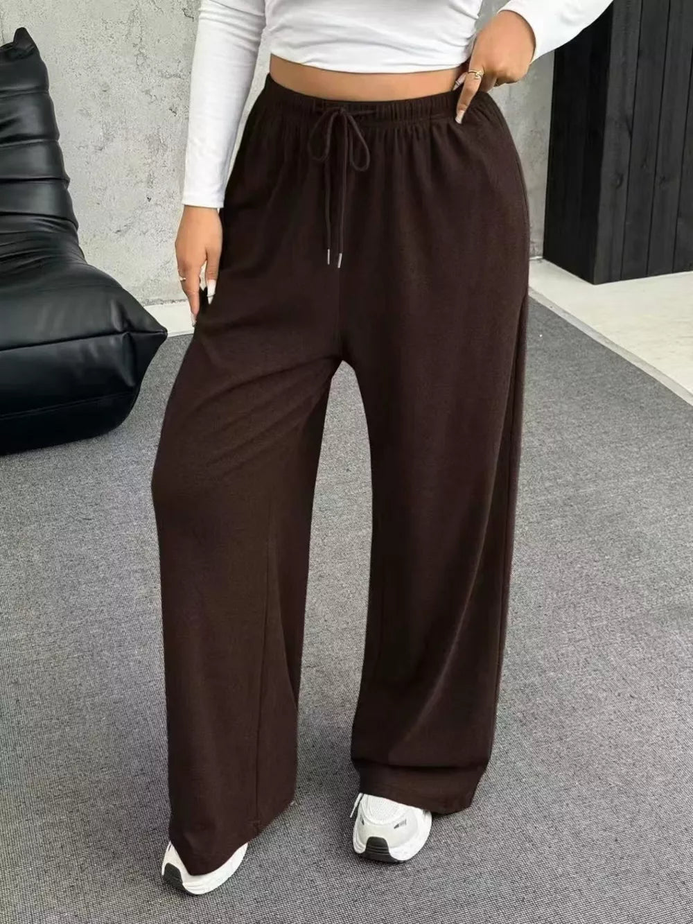 Brown drawstring wide-leg maternity pants with a comfortable, casual fit.