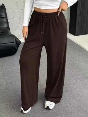 Brown drawstring wide-leg maternity pants with a comfortable, casual fit.