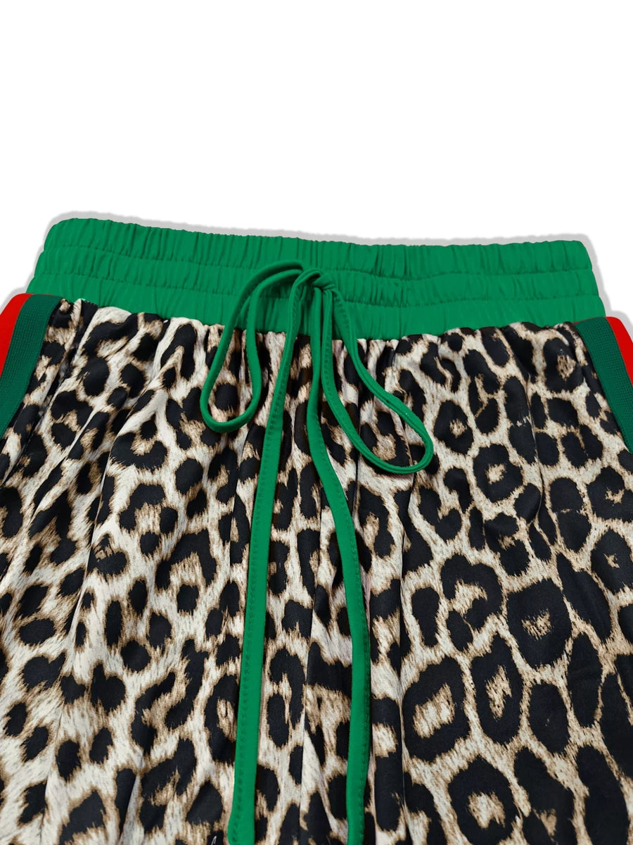 Leopard print loungewear pants with green drawstring and elastic waist