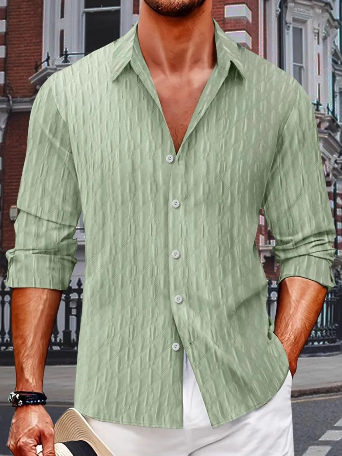 Sage green textured weave relaxed fit button-down shirt with a collared neckline.