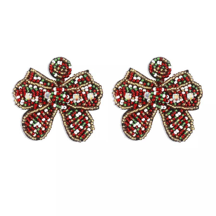 earrings in green with geometric and beaded