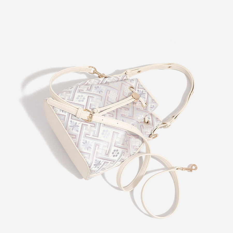 PU Leather Imported Size &amp crossbody bag in cream with bucket silhouette