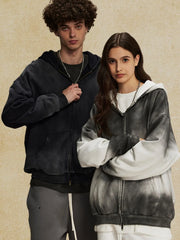 Ombre washed zip-up hoodie with a faded black to white gradient, featuring a relaxed fit and front pockets.