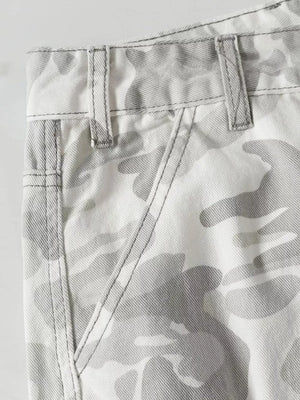Men's utility cargo pants in white and grey camouflage pattern, featuring contrast stitching and belt loops.