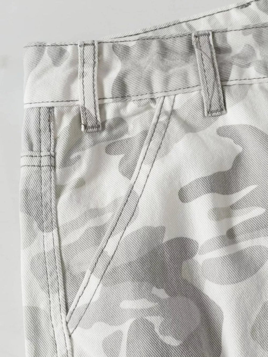 Men's utility cargo pants in white and grey camouflage pattern, featuring contrast stitching and belt loops.