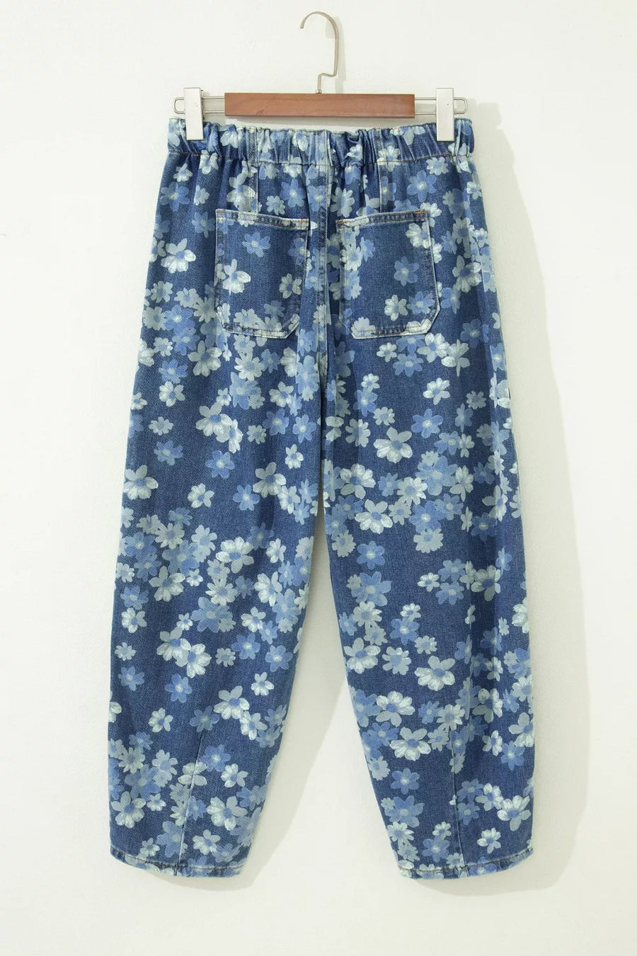 Blue floral cotton barrel jeans with drawstring waist and pockets