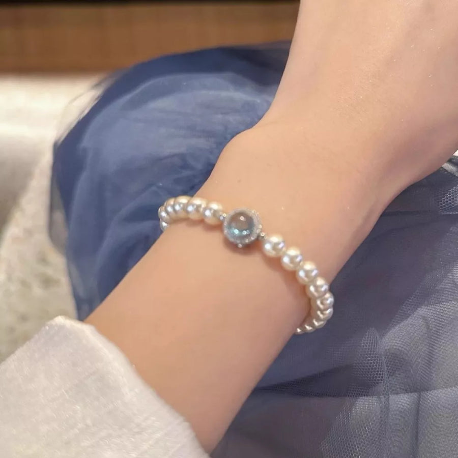 Synthetic Pearl, 925 sterling silver, Zircon Care instructions: Avoid wearing du bracelet in aquamarine with straight