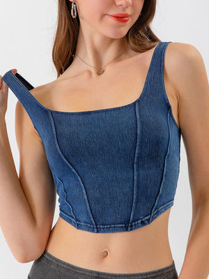Denim corset crop top with square neckline and visible stitching details.