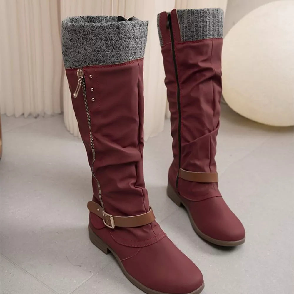 Burgundy suede slouch knee-high boots with knit cuff and side zipper detail.