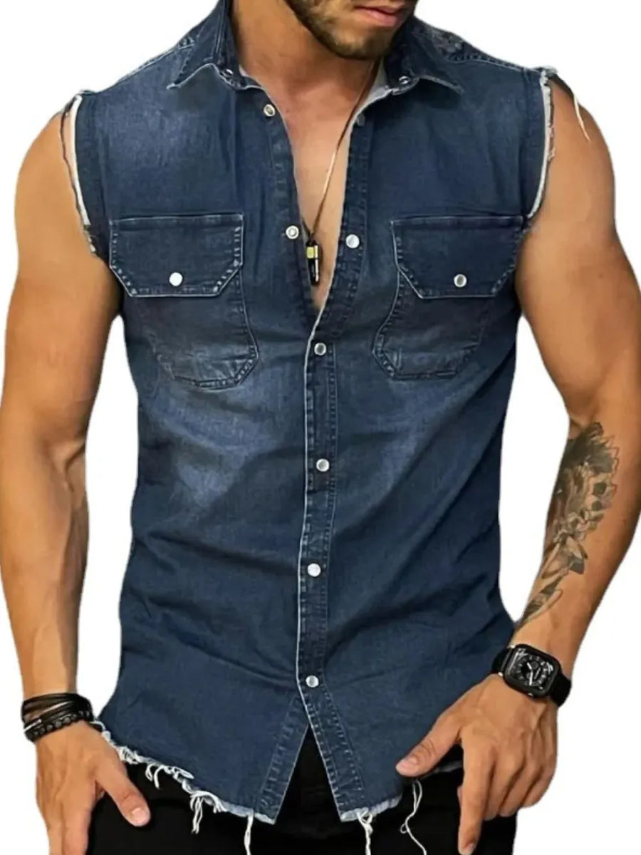 Men's raw-edge denim sleeveless shirt in navy with button front and chest pockets.