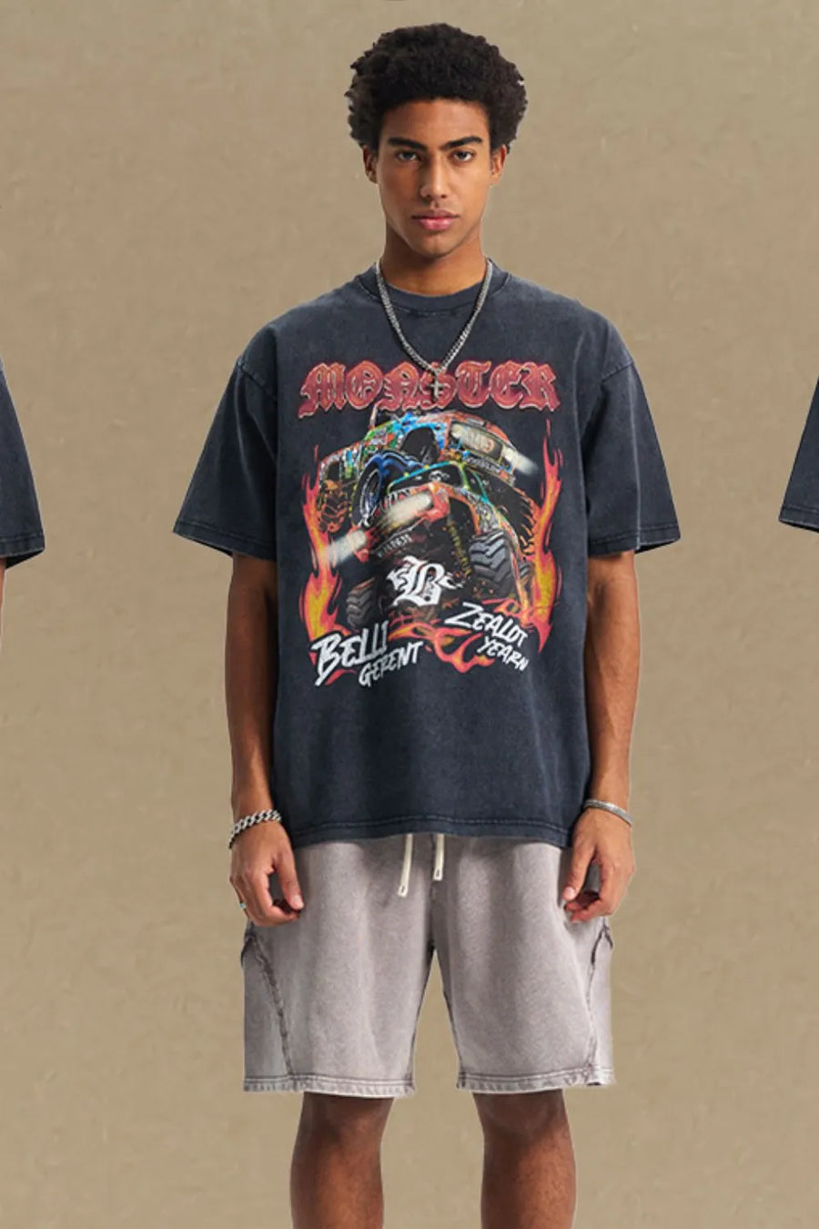 Black vintage graphic tee with monster truck and flames design