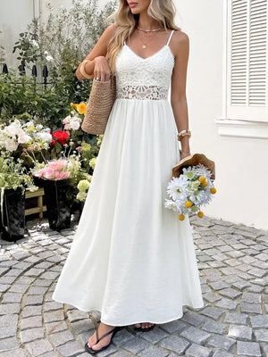 White lace-detail V-neck maxi dress with cutout waist and spaghetti straps.
