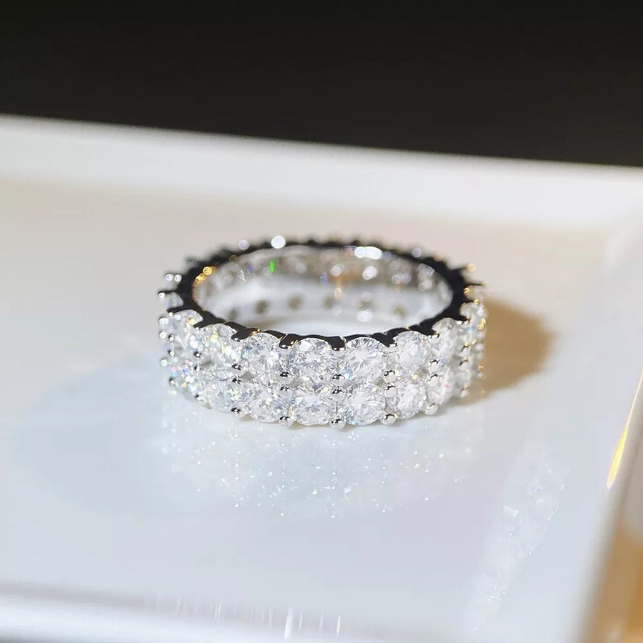 925 sterling silver,Moissanite Care instructions: Avoid wearing during exercise, ring in clear with N/A silhouette