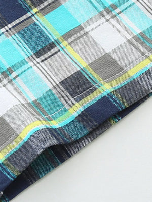 Boys' cotton plaid shorts with navy, teal, and yellow checks.