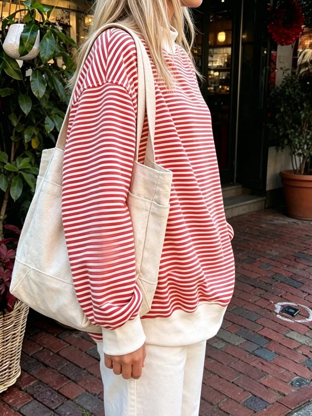 Pink sweatshirt with pullover and striped