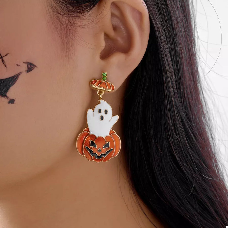 white earrings featuring dangle and novelty