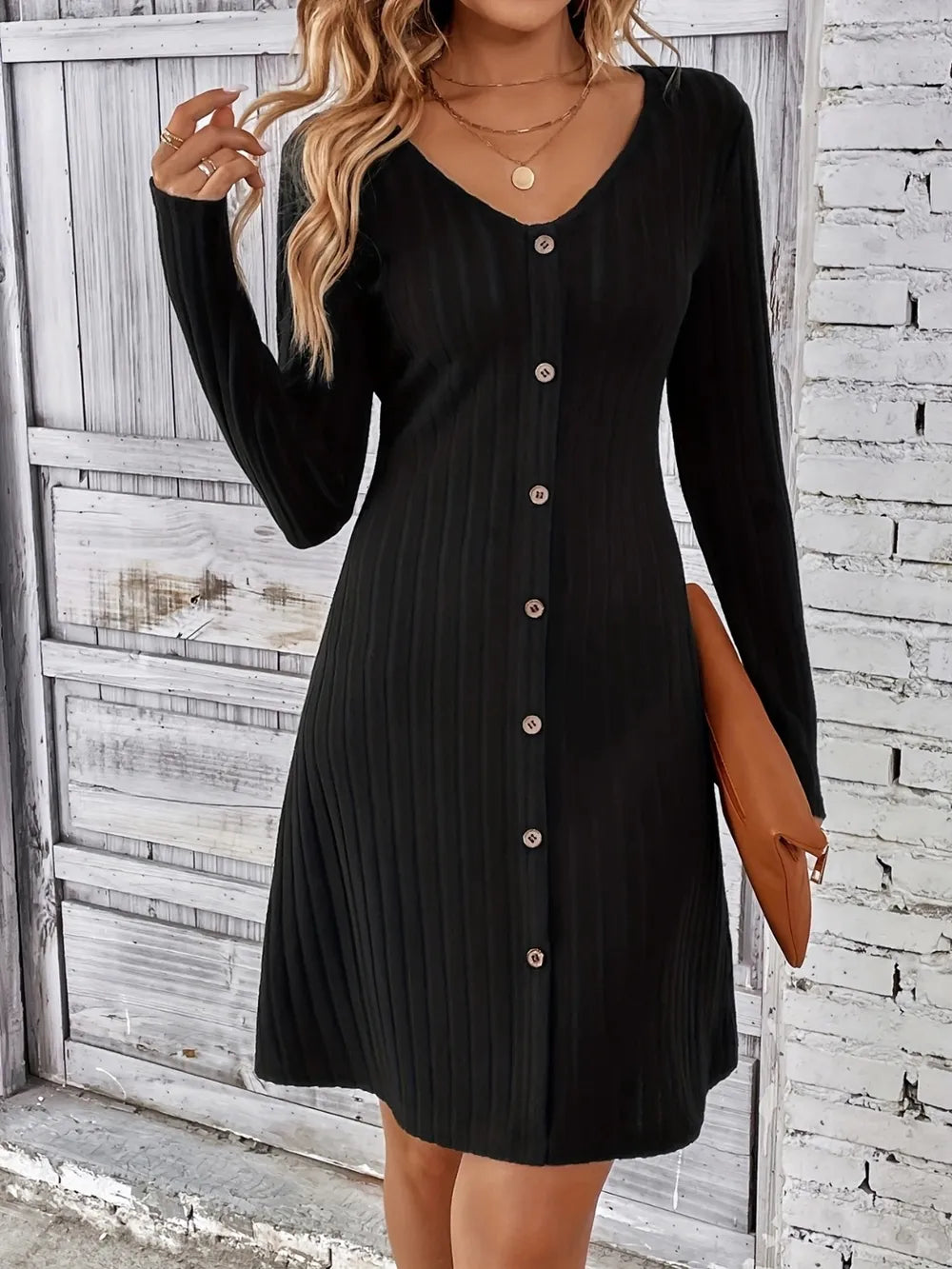 black mini dress with ribbed and v-neck
