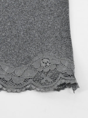 Grey bodycon mini dress with lace trim hem detail