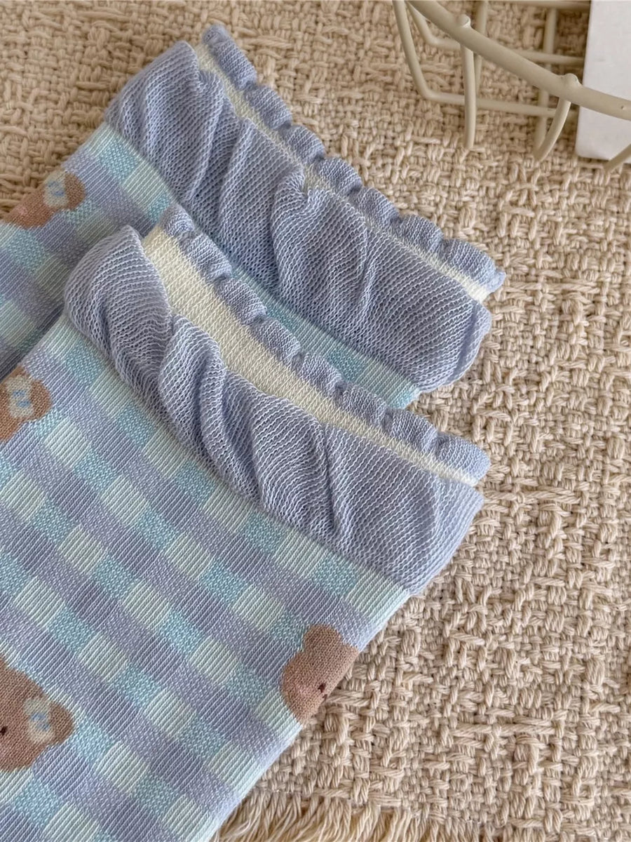 socks in Pastel Blue with ruffled cuff and crew length