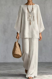 100% polyester Care instructions: Machine wash cold two-piece set in ivory with relaxed silhouette