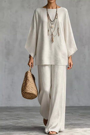 100% polyester Care instructions: Machine wash cold two-piece set in ivory with relaxed silhouette