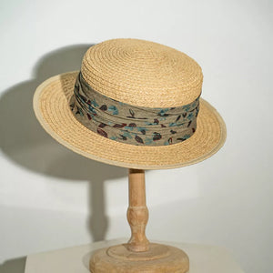 Straw boater hat with floral band in tan, botanical pattern, casual sun hat for women.