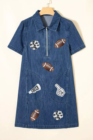 Denim mini dress in dark blue with football and cheer patches, short sleeves, collar, and zip front.