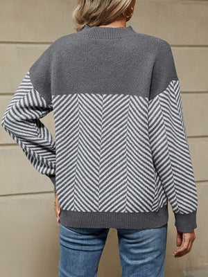 100% polyester Care instructions: Machine wash cold pullover sweater in Gray with relaxed silhouette