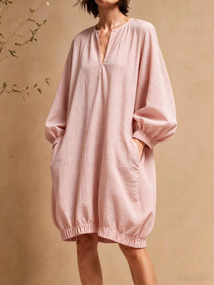 mini dress in blush pink featuring pocketed and loose fit