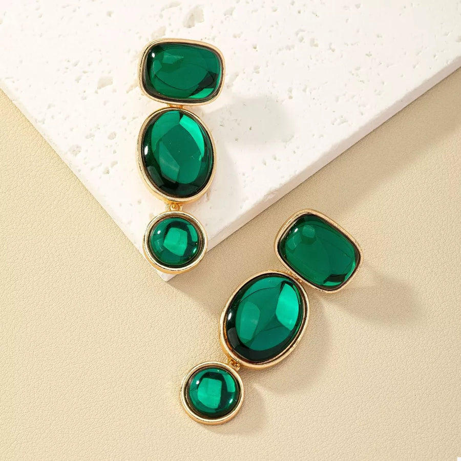 earrings in emerald green with drop design and long