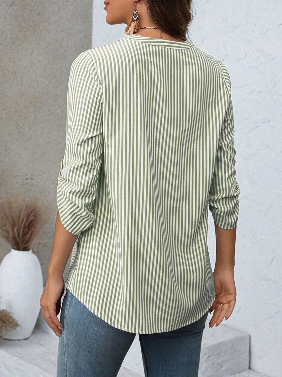 Green Bar vertical stripe V-neck blouse with roll-up sleeves and buttoned front.