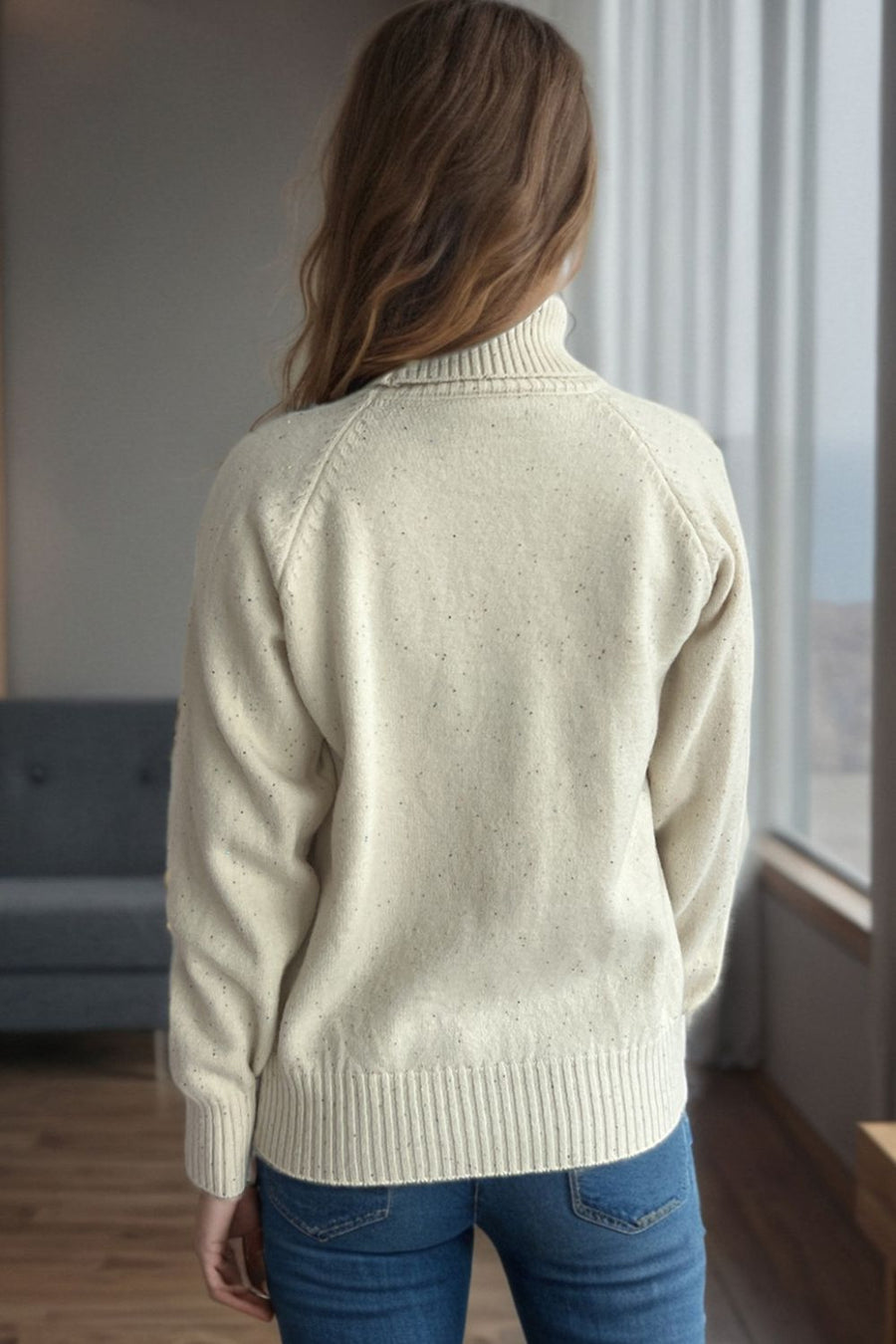 Cream speckled Donegal turtleneck pullover sweater with ribbed cuffs and hem