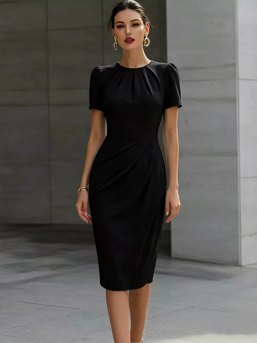 Black midi dress with ruched waist and pleated asymmetrical skirt