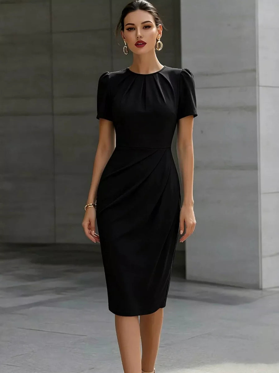 Black midi dress with ruched waist and pleated asymmetrical skirt