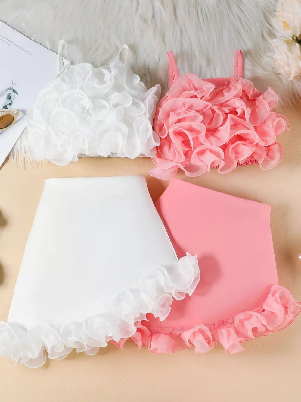 Baby cami and skirt set with delicate ruffles in white and pink.