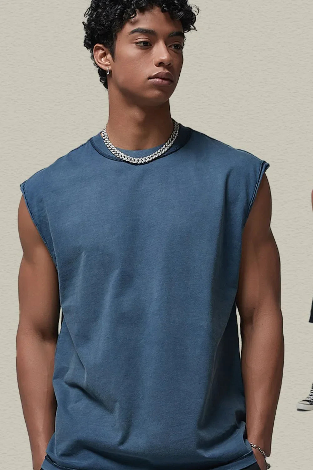 Washed cotton cut-off tank top in navy with a crew neck and sleeveless design.