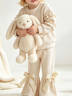 95% cotton, 5% polyester Care instructions: Machine wash cold lounge set in Apricot Color with flared silhouette