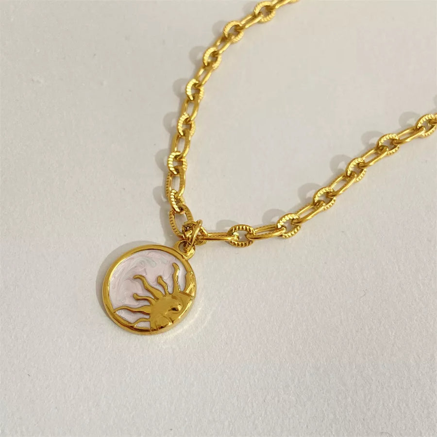 ivory necklace featuring gold-plated and celestial