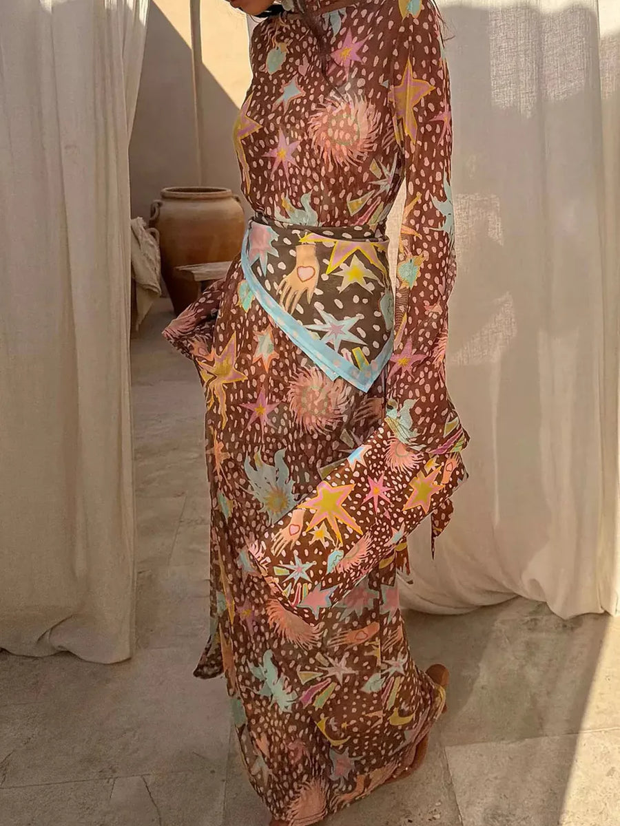 Brown celestial print maxi dress with a scarf belt and bell sleeves.