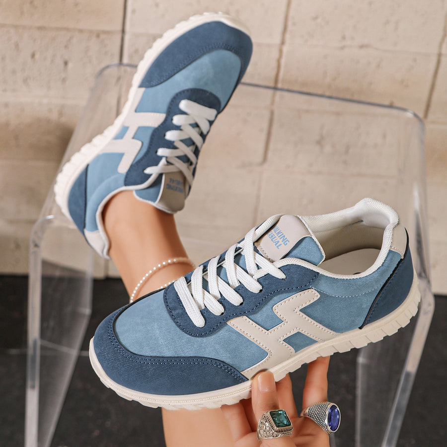 sky blue sneakers featuring round toe and color-block