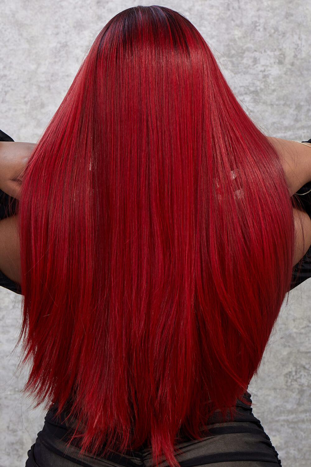 Crimson straight lace front wig with red ombre color and dark roots.