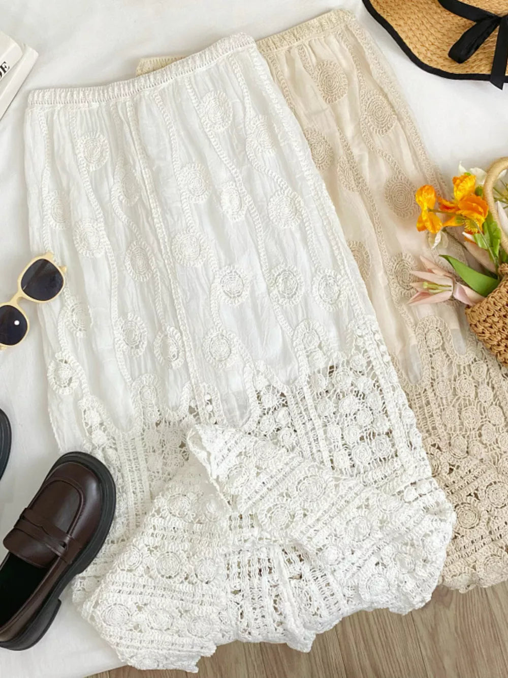 White lace midi skirt with elastic waist and crochet details