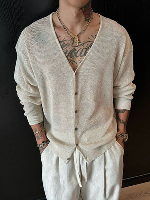 cardigan in ivory featuring lightweight and relaxed fit