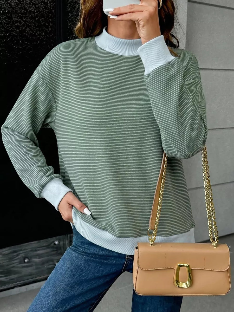 light blue sweatshirt featuring stretch and striped