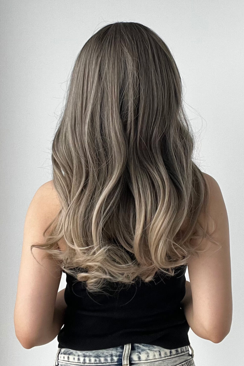 Ombre Wave Synthetic Wig in Ash Brown/Blonde Ombre with loose waves.