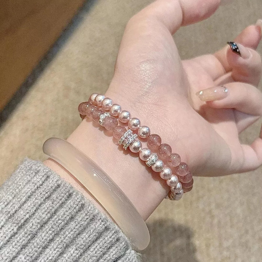 Synthetic Pearl,Crystal,Zircon Care instructions: 1 bracelet in light pink with regular silhouette