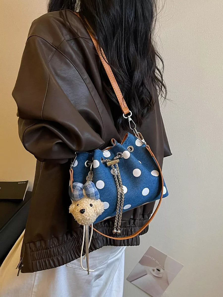 Polyester Imported Size &amp crossbody bag in tan with bucket silhouette