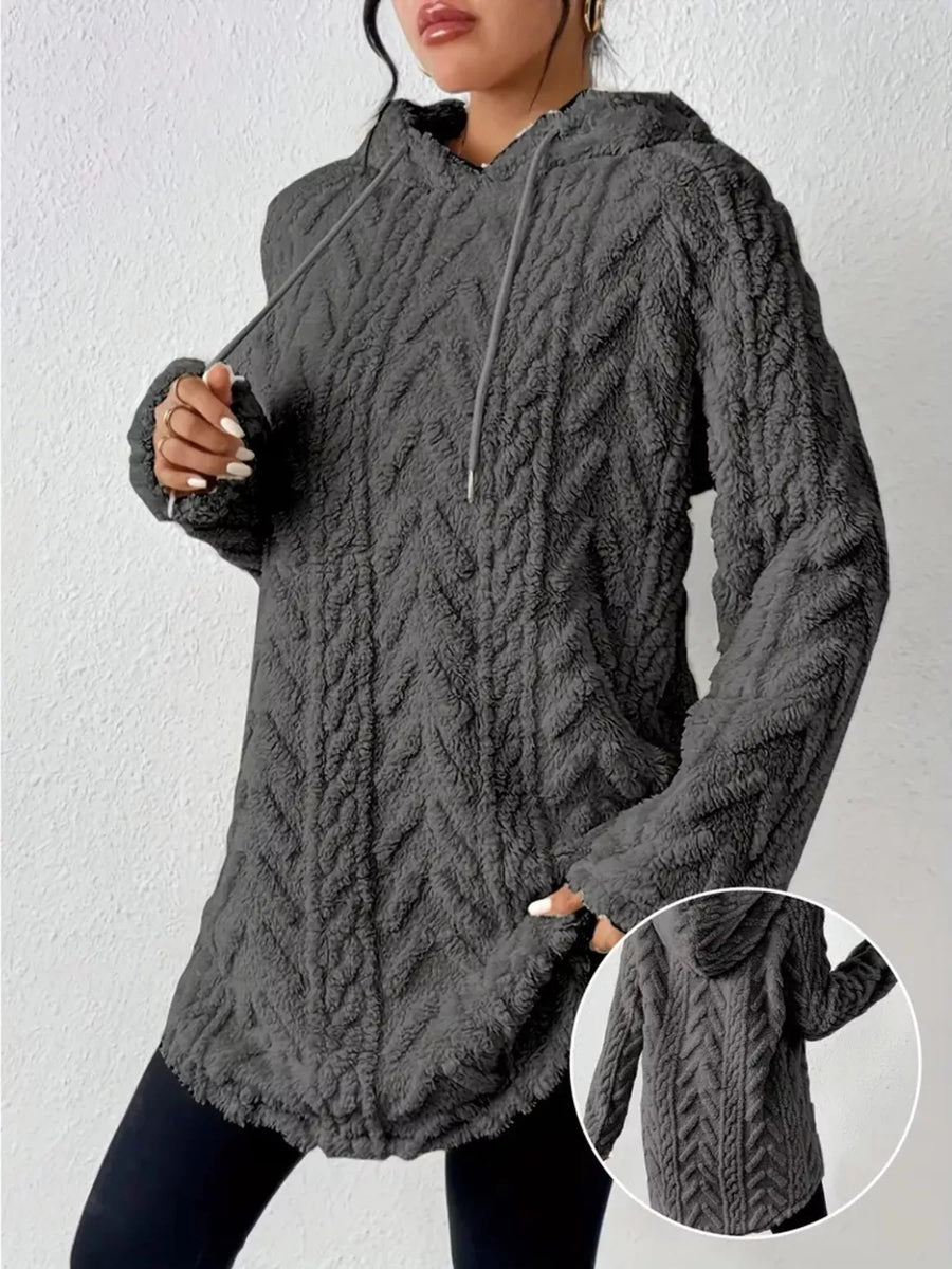 Textured gray fleece hoodie with drawstring and pockets, featuring a cable knit pattern.