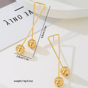 earrings in Gold with geometric and drop design